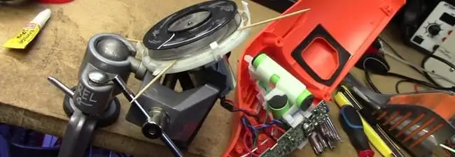 Vacuum cleaner repair parts and tools on a workbench in San Francisco, CA